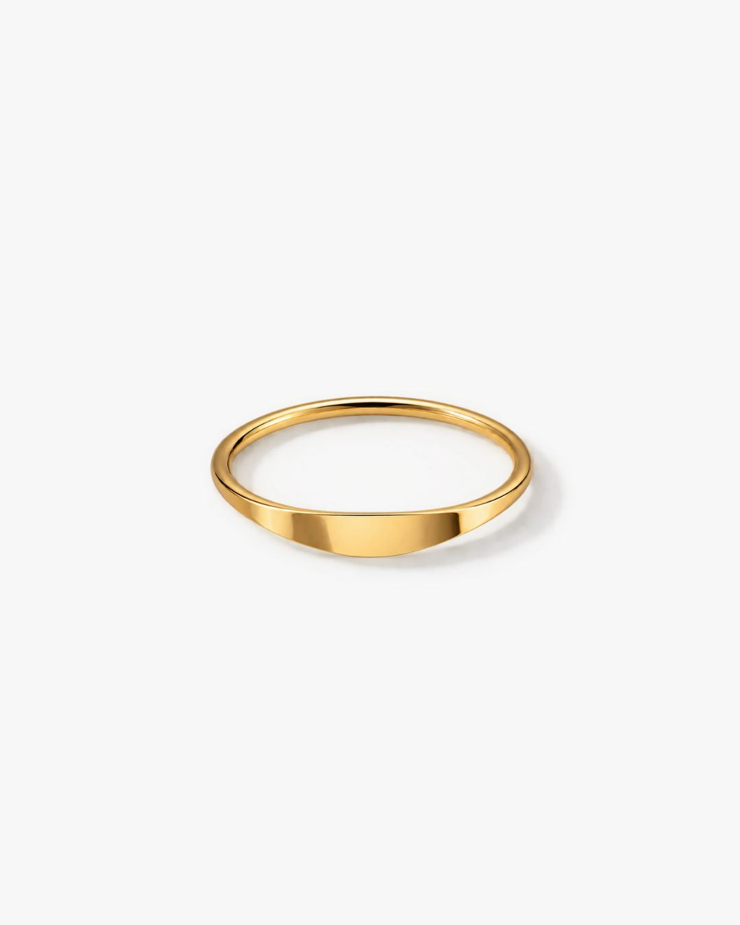 A minimalist signet gold-filled band ring with a polished, slightly tapered oval shape, shown on a clean white background.
