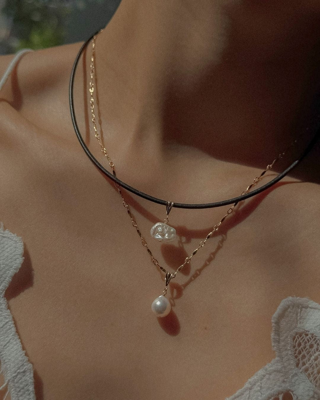 Layered pearl pendant necklaces worn - Midori Jewelry Co.